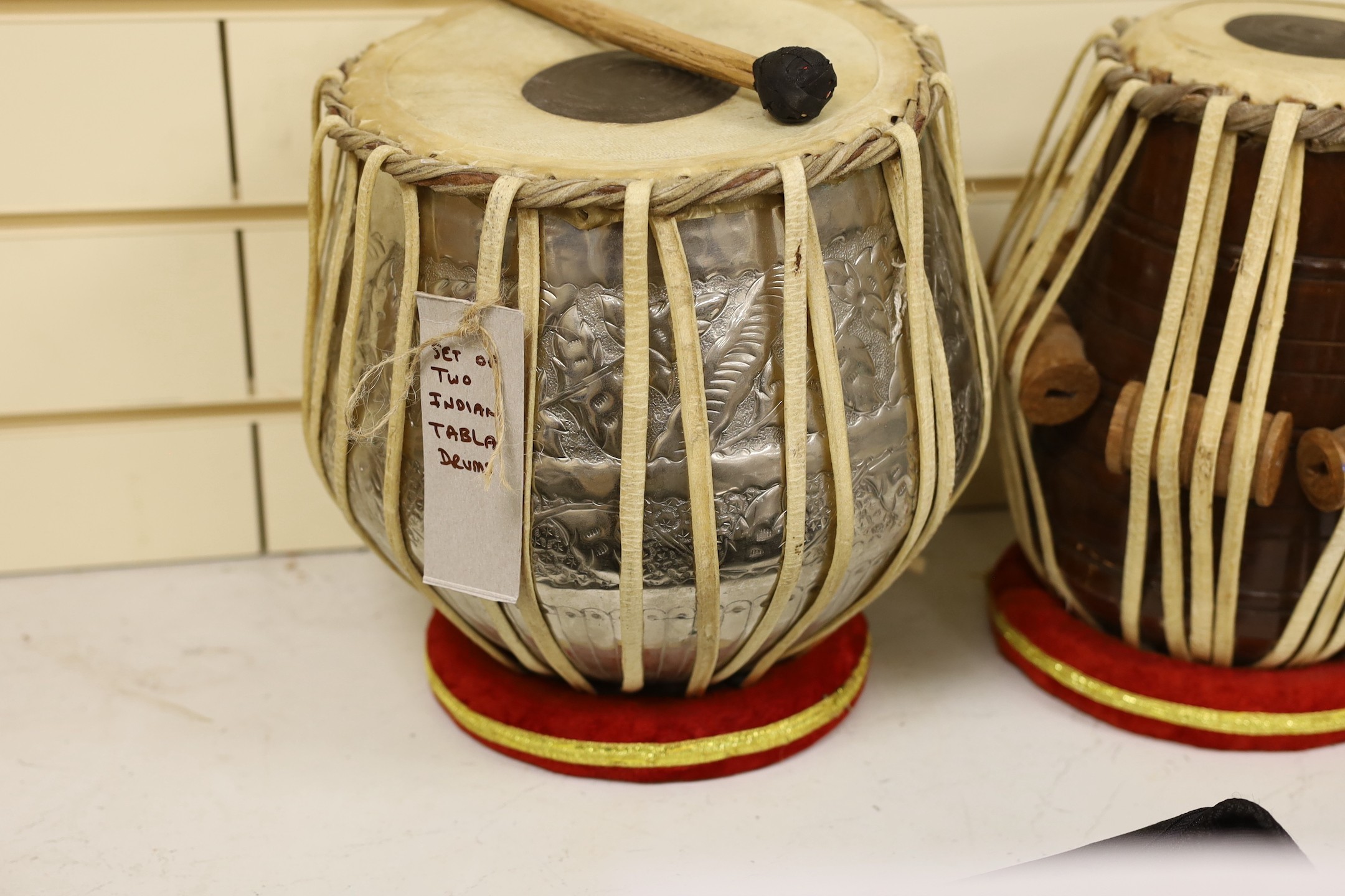 Two Indian Tabla Drums, largest 25 cms diameter.